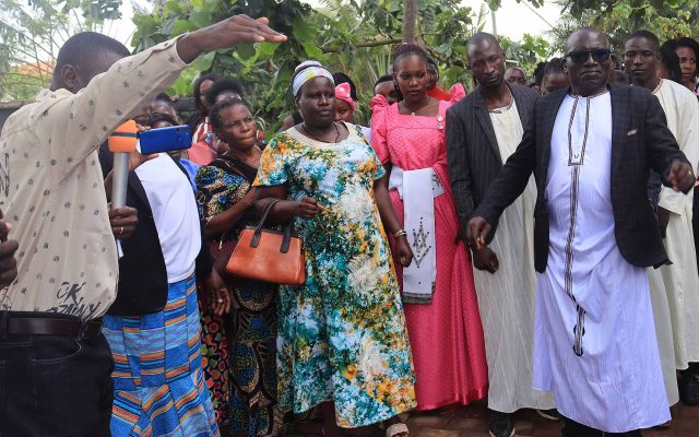 Guests tour the Busoga cultural village